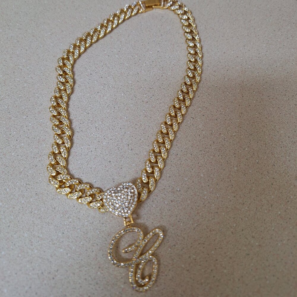 GOLD NECKLESS.